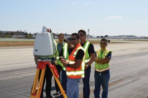 Representatives from the business Courtroom Presentations learn how a laser scanner works at the Los Angeles International Airport.