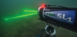 Underwater lidar scans at night on the USS Arizona; Shaan Hurley of Autodesk photographed the scanner, which was provided by 3D at Depth.
