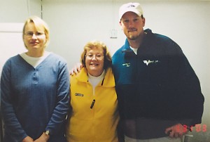 Darcy Merritt who survived the decline of her job as lab manager running the film photo lab by transitioning her skills to the computer-based production of orthophotos; at center is Cathy Graville (now owner of VAP); at right is Nate Pickens who served as the first pilot Cathy hired after Richard’s death.