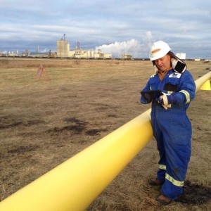 Enmapp employee inspects pipeline using TerraGo