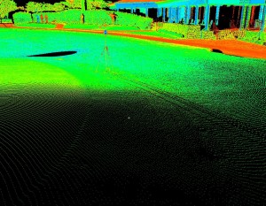 Point cloud detail from a single scanner scan displayed in Leica Cyclone with points colored by intensity. Terrestrial lidar enables the highest-accuracy surface measurement of the putting green, and high-definition measurements of TLS enable the capture of complex surface curves. Mow lines of the putting surface and collar edges are visible in these scan lines. The black and whhite checkboard target is precisely located on the georeferenced mark; Pinehurst No.2, Pinehurst, North Carolina, 18th green, site of the 2014 U.S. Open Men's and Women's championship tournaments. © 2015 GOLFAR