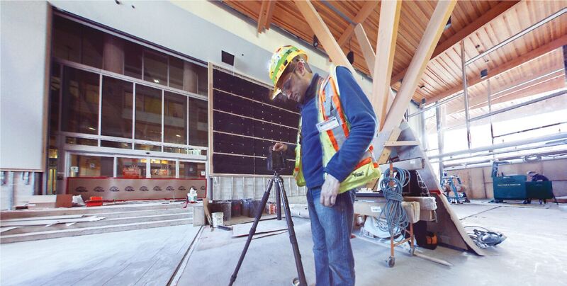 A crewman from Underhill Geomatics, Inc., uses an iStar Fusion camera to document the construction of a hospital in Vancouver.