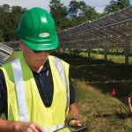 John Heiser, a senior environmental research engineer at Brookhaven National Laboratory (BNL) collects solar data at the Long Island Solar Farm—a 200-acre, 32 MW facility located on the BNL campus.
