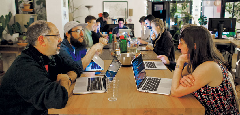 Maptime co-founder Alan McConchie (back, left) teaches Tilemill 1 and 2 at a Maptime meetup at Stamen’s offices in 2014. Credit: Christie Hemms.