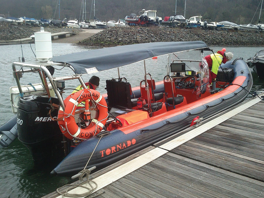 A rigid inflatable boat used to survey in very shallow water.