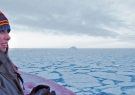 Shannon Hoy on the bow of the RVIB Nathaniel B. Palmer as she crossed through the Bransfield Strait in 2011. Photo by A. Margolin.