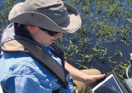 Lawrence Spencer puts the Trimble R1 GNSS receiver and iPad to work on the Kissimmee River.