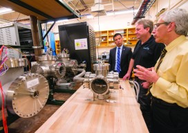 In the atomic clock laboratory with Dr. Villahermosa (left), the author (center), and Dr. James Camparo, Aerospace Fellow, Electronics and Photonics Laboratory (right)