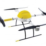 small micro drone with four rotors, black white and yellow