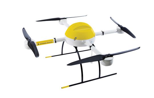 small micro drone with four rotors, black white and yellow