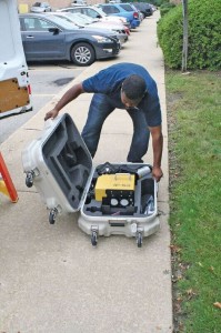 Marcus Mars, CCS manager, readies the IP-S3 for installation on one of the company's vans.