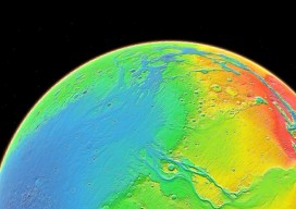 Color coding in this image of Mars represents differences in elevation, measured by NASA's Mars Global Surveyor. While surface liquid water is rare and ephermal on modern Mars.