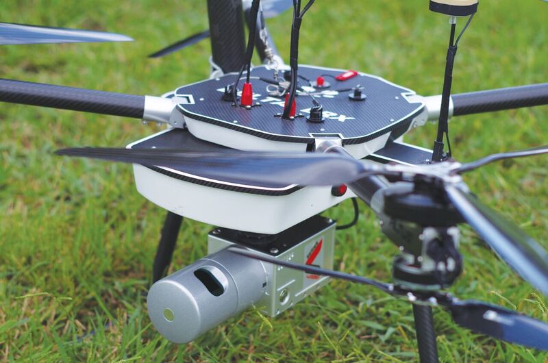 An Altus LRX multicopter outfitted with a Snoopy A-series HDL-32E.