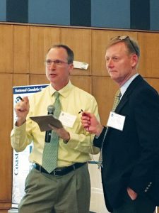 (l to r) Dru Smith, NSRS modernization manager, and Brad Kearse, deputy director of NGS, answer questions during the 2017 Geospatial Summit.
