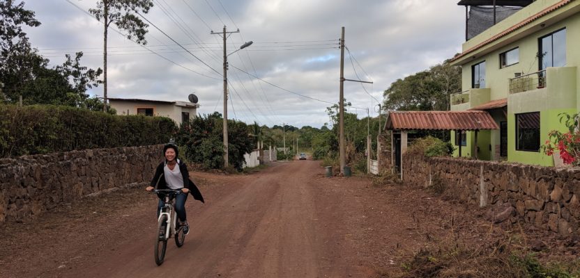 Biking to capture street imagery in the Galapagos. © Chris Beddow