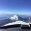 The Citation photogrammetry jet approaches Pico de Orizaba, the third highest peak in North America at 18,491 feet above sea level, on a photogrammetry mission.