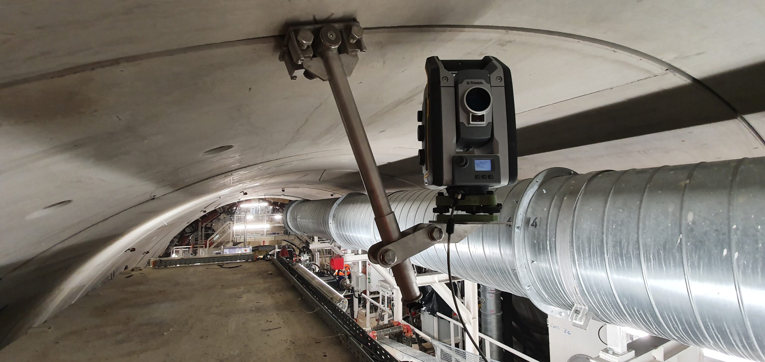 Working close behind the TBM, a total station automatically measures profiles of concrete rings lining the L14 South tunnel. Photo credit: Filipe Afonso, Eiffage GC