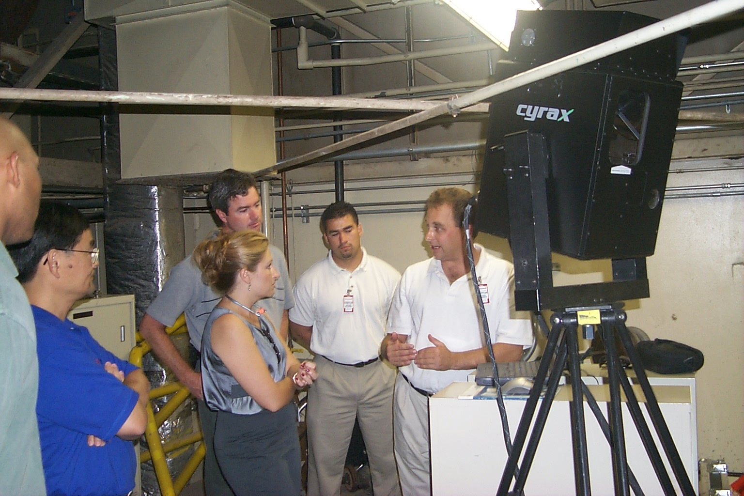 Demos of Cyrax were critical for generating sales. Far right is application engineer Guy Cutting. Cyra salesman, Tony Grissim, is middle-rear. Like the author, Grissim left Trimble to join start-up Cyra. 