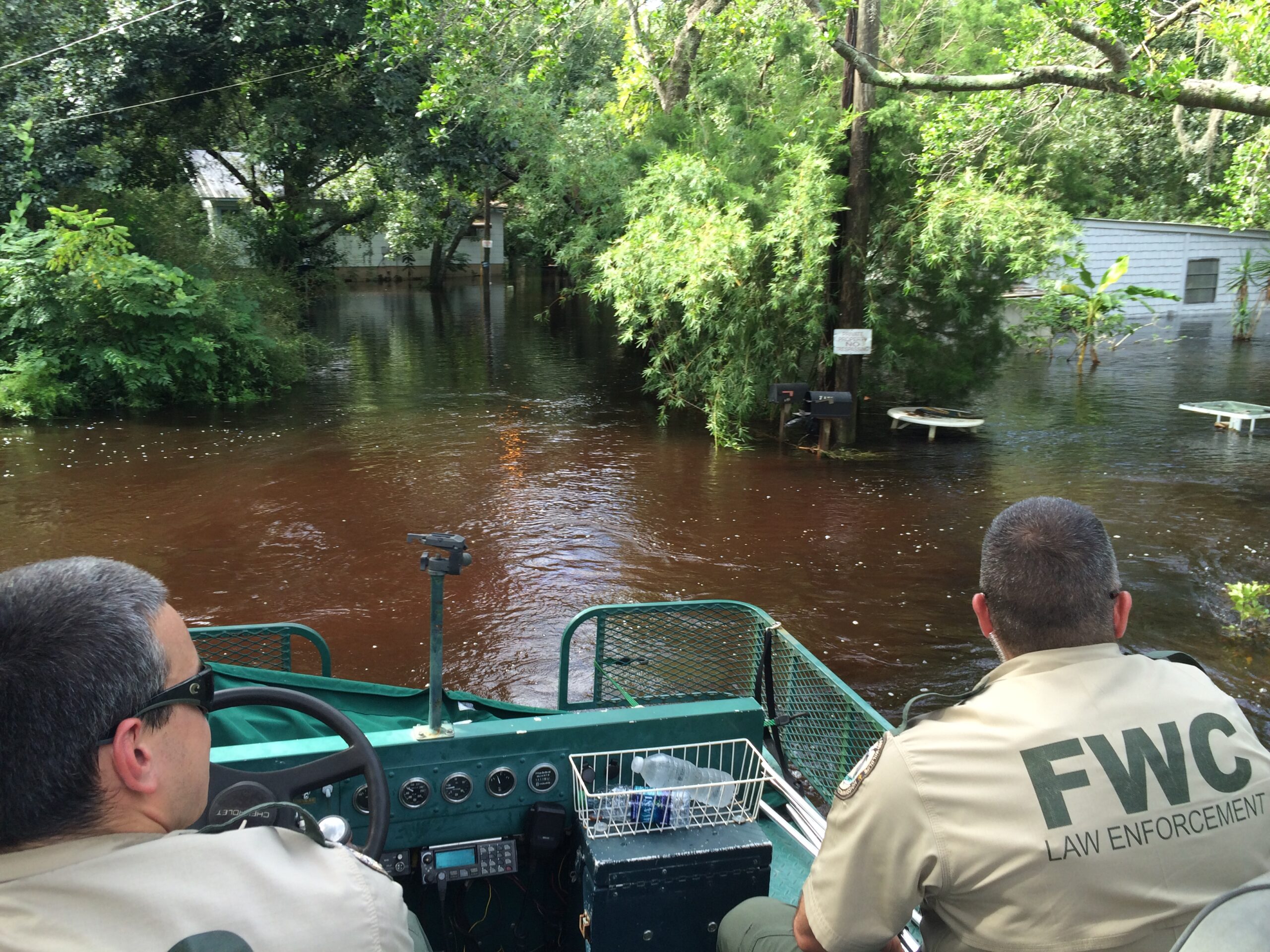 Officers from the Florida Fish and Wildlife Conservation Commission perform search and rescue on the flooded Anclote River following Hurricane Hermine.
