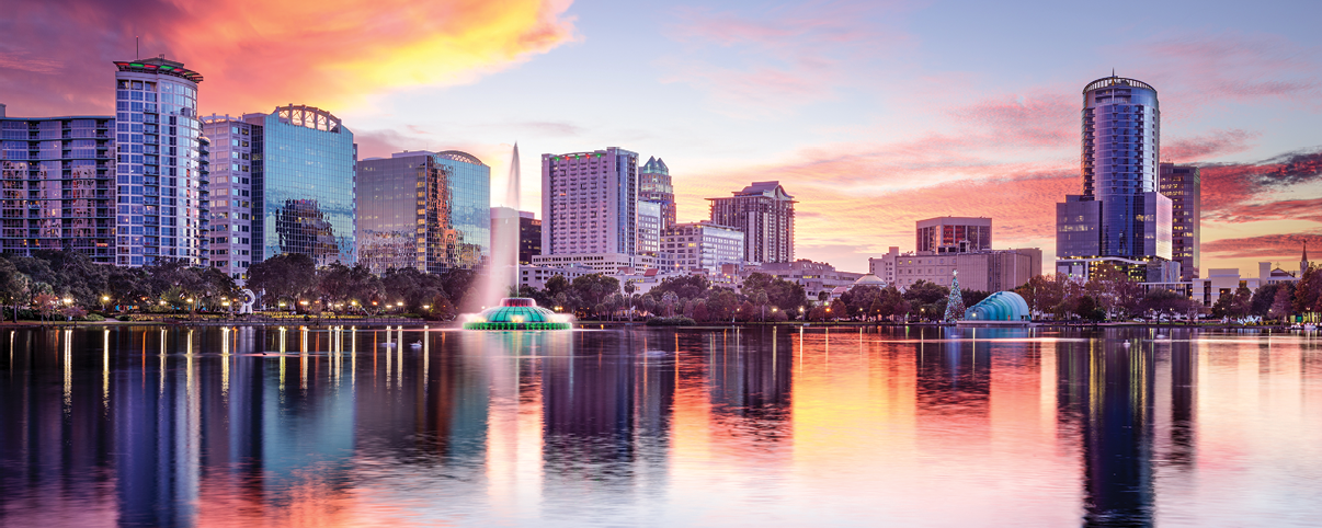 Orlando, Florida, USA downtown city skyline from Eola Park.